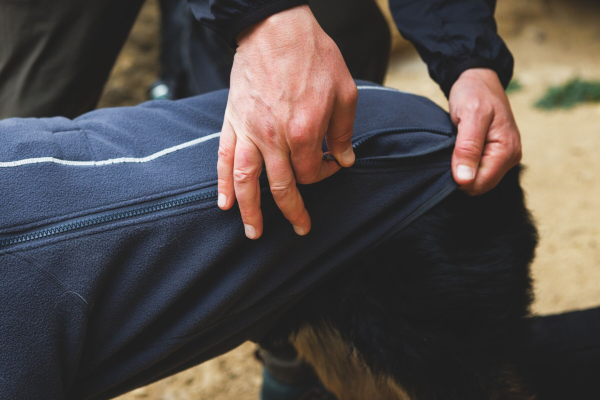 Man zipping up the Climate Changer™ Fleece Jacket.